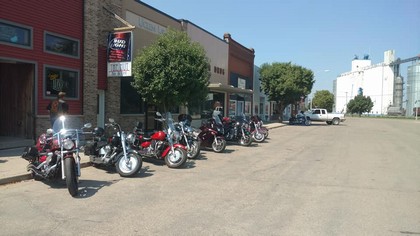 motorcycles lined up on street