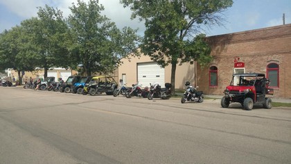 motorcycles lined up on street